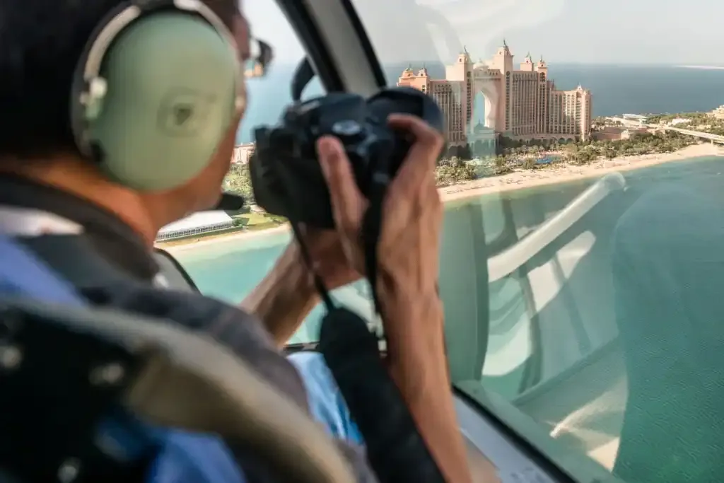 Guest photographing Atlantis The Palm from the helicopter