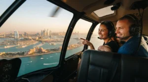 Passengers looking out at the coastline during the best time of day for a helicopter ride in Dubai.